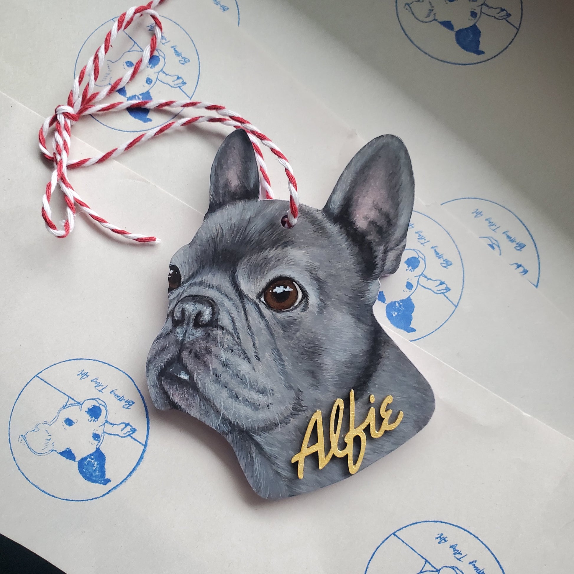 Gray dog-shaped ornament with 'Alfie' name 